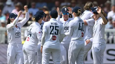 England celebrate the wicket of Shafali Verma