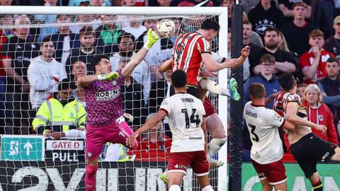 Kieffer Moore heads home the first goal