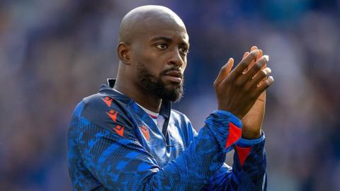 Jean-Philippe Mateta applauding towards Crystal Palace fans after the game at Everton