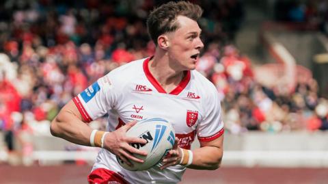 Hull KR's Jack Broadbent runs in to score a try