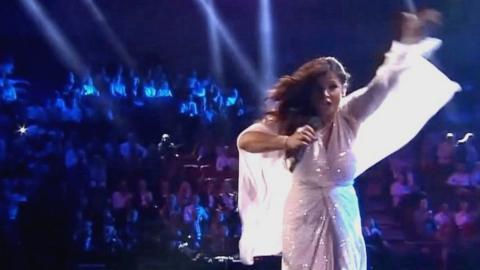 Swedish singer Carola falling off stage