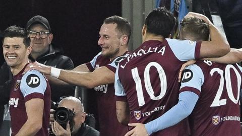 West Ham players celebrate beating Freibur