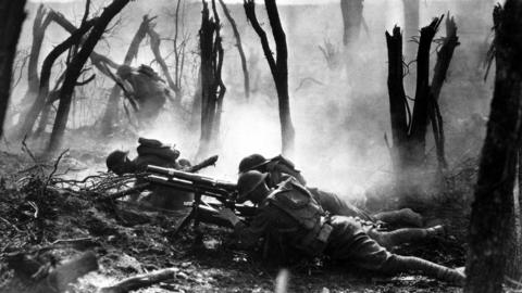 Gun crew from Regimental Headquarters Company, 23rd Infantry, firing 37mm gun during an advance against German entrenched positions. 1918. (Army)