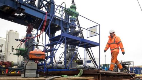 File photo dated 05/101/8 of a worker at the Cuadrilla fracking site in Preston New Road, Little Plumpton, Lancashire