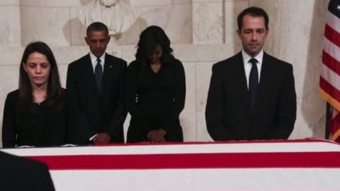 US President Barack Obama (centre-left) and First Lady Michelle Obama (centre-right) pay respects to Supreme Court Justice Antonin Scalia in Washington. Photo: 19 February 2016