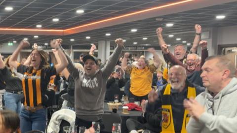 Hull City fans celebrating at the MKM stadium.