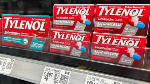 Red boxes of Tylenol caplets are seen in a pharmacy in Houston, Texas, on September 23, 2025.