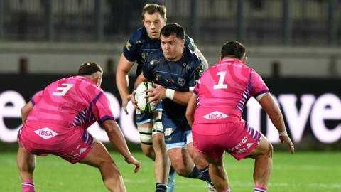 Dragons prop Chris Coleman runs with the ball