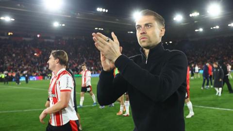 Tonda Eckert applauds the Southampton fans 