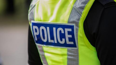Close up of police uniform 