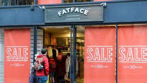 Man entering Fatface store