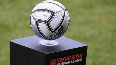 A National League branded football on a plinth