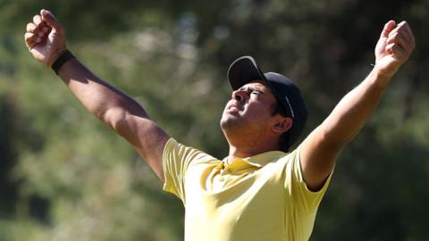 South Africa's Yurav Premlall holds his arms aloft in celebration