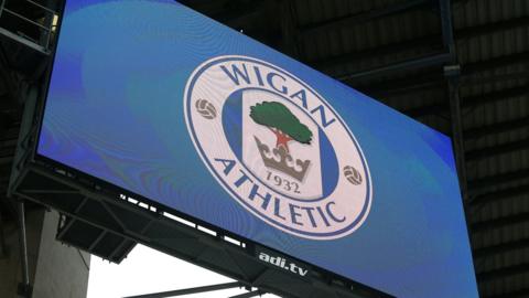 Wigan Athletic crest on a big screen