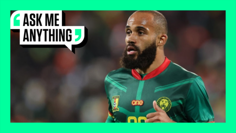 Bryan Mbuemo in a Cameroon shirt with an Ask Me Anything border around him