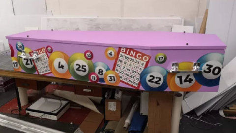 A bingo-themed coffin