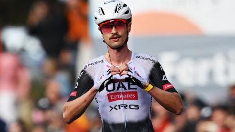 Jay Vine of Australia and UAE Team Emirates - XRG celebrates at finish line