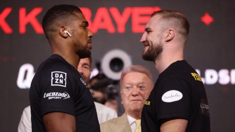 Anthony Joshua faces off with a smiling Otto Wallin