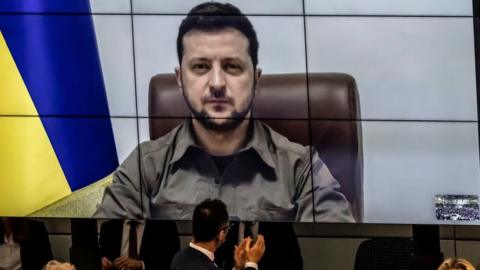 Ukrainian President Volodymyr Zelensky addresses the Bundestag via live video from the embattled city of Kyiv on March 17, 2022 in Berlin, Germany