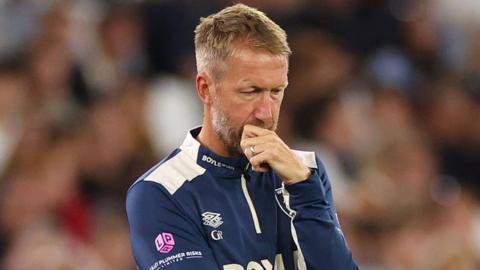 Graham Potter looking downcast during West Ham's defeat against Chelsea last Friday.