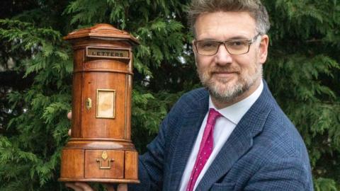The post box and auctioneer Charles Hanson