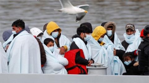 Migrants waiting to disembark at Dover