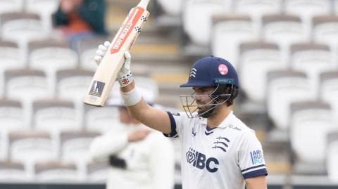 Max Holden, Middlesex CCC acknowledges his fifty 