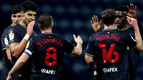 Watford players celebrate victory at Preston