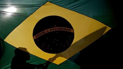 Supporters of far right-wing presidential candidate Jair Bolsonaro rally at the Paulista Avenue