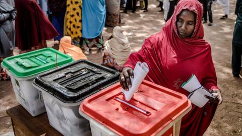 Woman voting