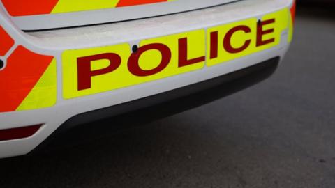 A police car rear bumper