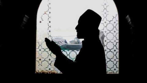 Sri Lankan Muslim Muslim Moulavi performsÂ Eid al-Fitr prayers that mark the end of the fasting holy month of Ramadan