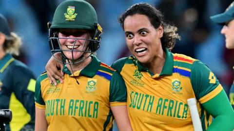 South Africa's Anneke Bosch and Chloe Tryon celebrate their win over Australia