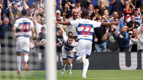 Paul Smyth celebrates acrobatically after scoring for QPR against Charlton Athletic