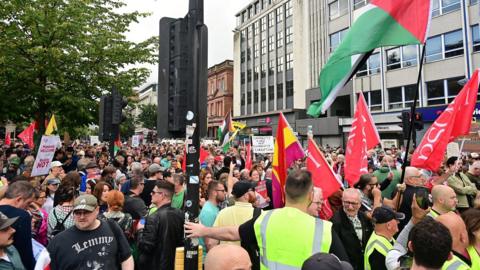 More than a thousand anti-racism protesters gathered in Belfast