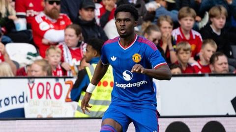 Jaydan Kamason in action for Manchester United against Rosenborg