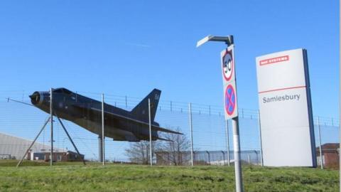 A replica of a Lightning fighter jet stands outside the main gate of the BAE Systems manufacturing site at Salmesbury, near Preston.