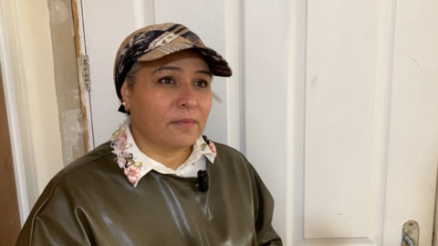 Fozia Malik in her apartment