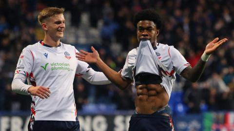 Thierry Gale of Bolton Wanderers celebrates scoring his side's second goal against Exeter