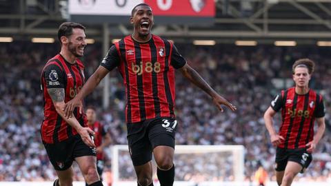 Bournemouth players celebrate scoring against Fulham
