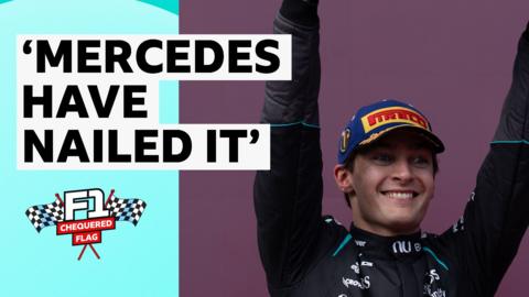 George Russell arms aloft celebrating Australian Grand Prix win