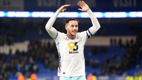 Josh Brownhill celebrates Burnley's win at Cardiff