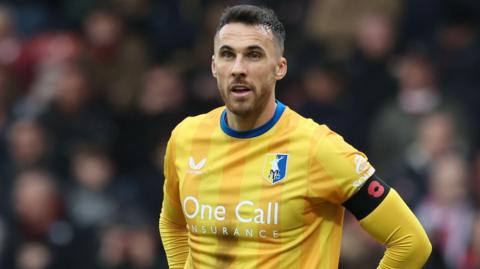 Lee Gregory in action for Mansfield