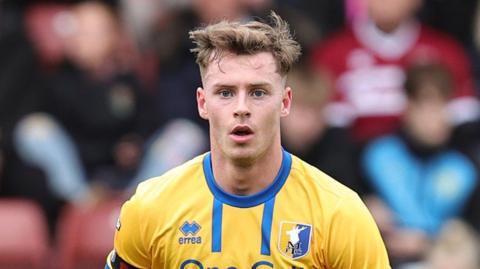Jamie McDonnell in action for Mansfield Town