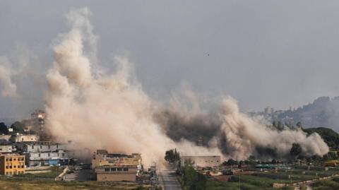 Smoke billows following an Israeli strike in Nabatieh, Lebanon.