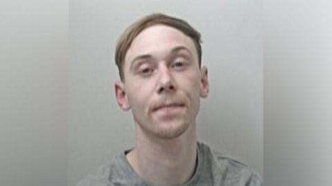 Police image of Jordan Brown who has light brown hair and stubble after he was jailed