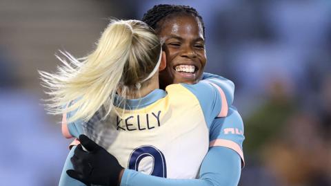 Khadija Shaw and Chloe Kelly celebrate