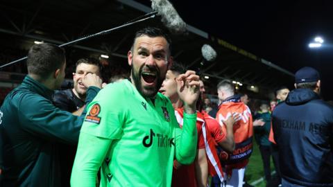 Ben Foster celebrates after Wrexham's win