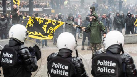 Protesters in Brussels march against the UN migration pact