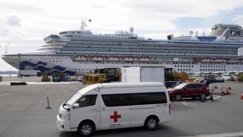 Infected passengers are taken off the ship to be treated in hospitals